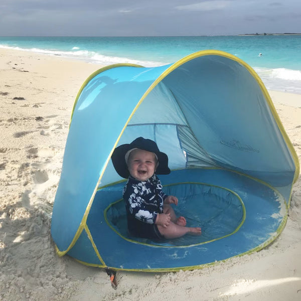 Baby Enjoying in Baby Beach Tent 