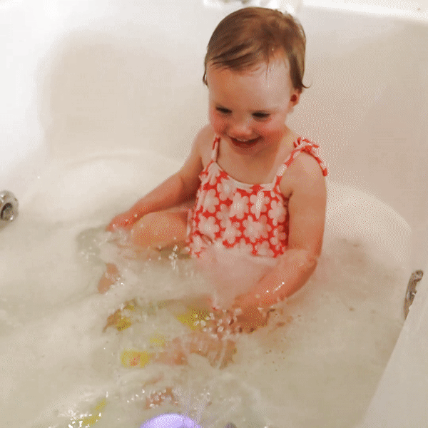  Baby Playing in Bath Whale Toy